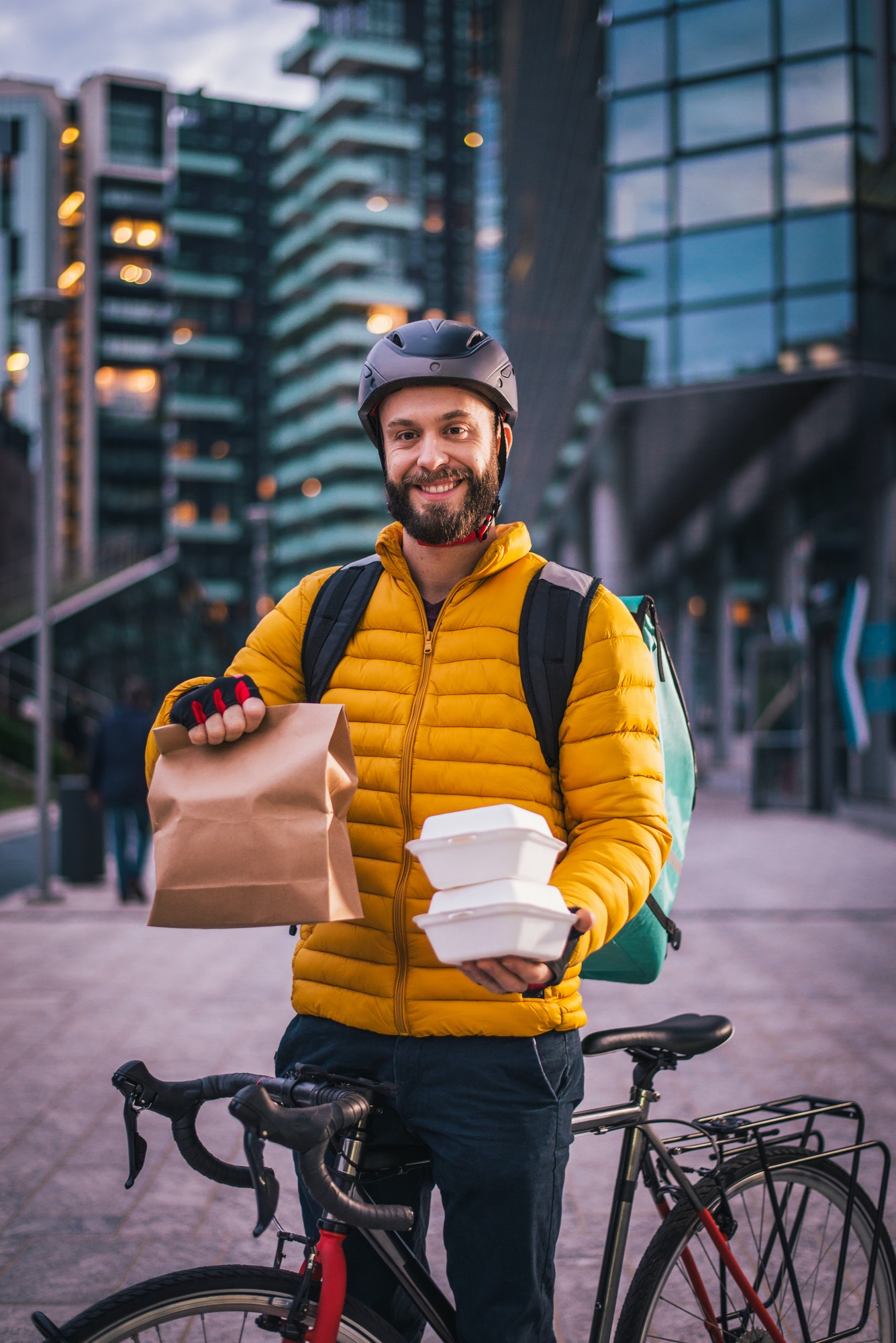 Food delivery, rider with bicycle delivering food